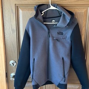 The North Face men’s small black and gray zip up. Heavier weight.